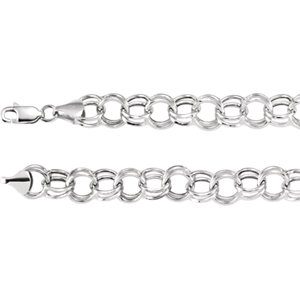 Close-up of a silver chain necklace with interlocking links.