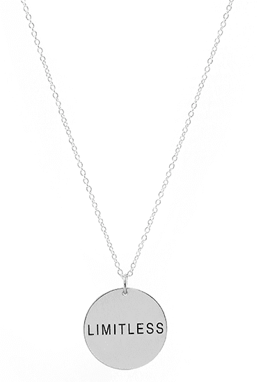 Simple silver chain necklace with a round pendant.