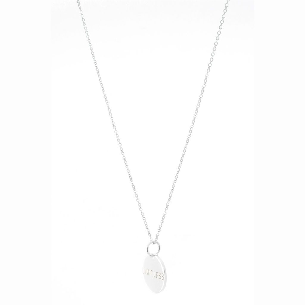 Elegant silver necklace with a clear teardrop pendant.