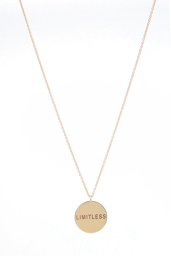 Elegant gold pendant necklace with a simple circular charm.