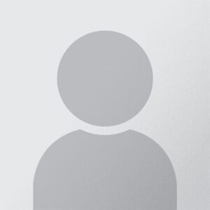 Placeholder avatar image with a gray circle on a light gray background.